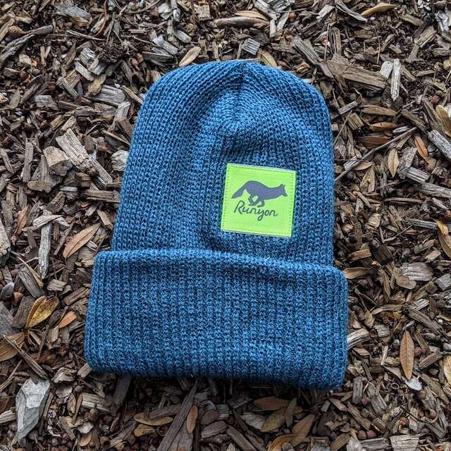 Runyon Aqua Neon Reflective Performance Knit Beanie
a shade of teal pairs well with our neon fluorescent yellow reflective patch