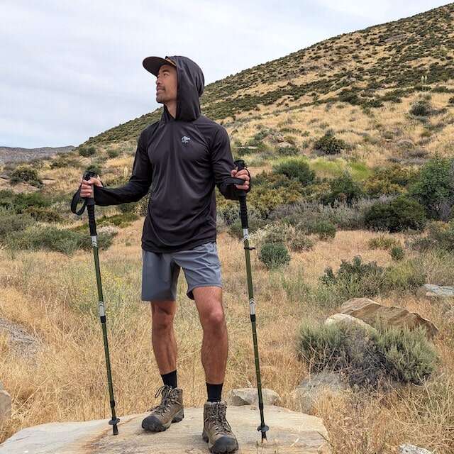Black color long sleeve technical hoodie shirts with built-in thumbholes UPF protection for running, hiking, fitness, gym, workouts.  American Made In USA. Runyon Canyon Apparel